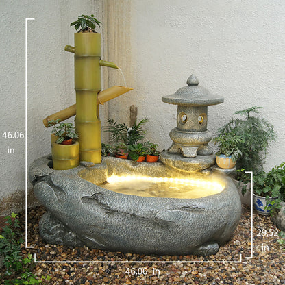 Japanese-Style Bamboo Fountain Waterfall With Idyllic Zen Flowing Water