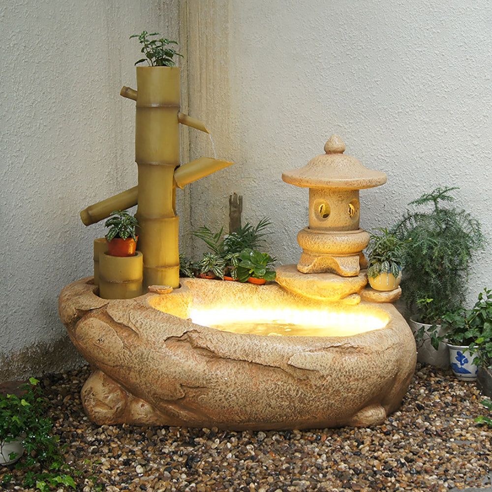 Japanese-Style Bamboo Fountain Waterfall With Idyllic Zen Flowing Water